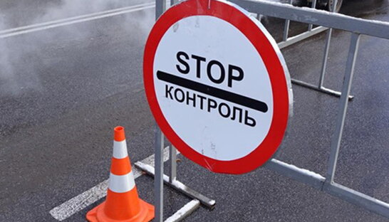 На Київщині поліція зупинила водія напідпитку зі зброєю