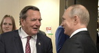 Мерц назвав «абсолютно аморальним» візит Шредера до Путіна на день народження